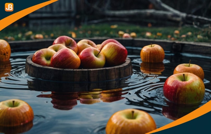 Apples floating in water for a fall festival apple bobbing game